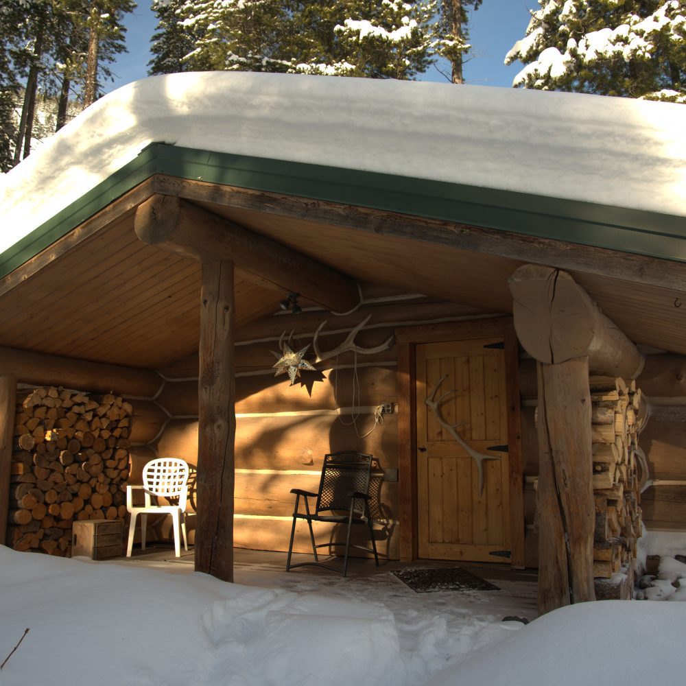 A wooden bunkhouse with ornaments