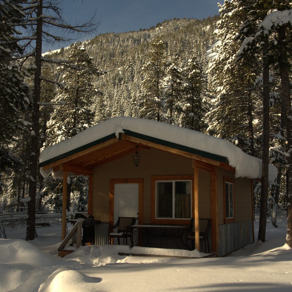 A bunkhouse covered in snow